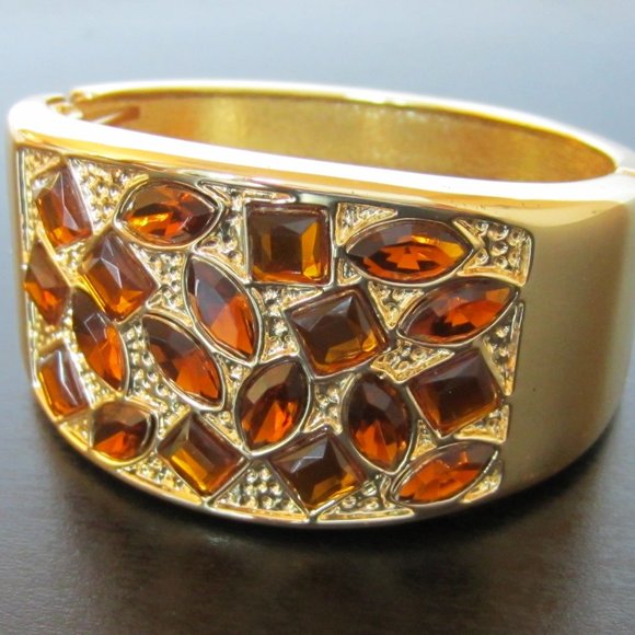 Gold Tone Hinged Bangle Bracelet with Topaz Colored Crystals - Picture 1 of 8